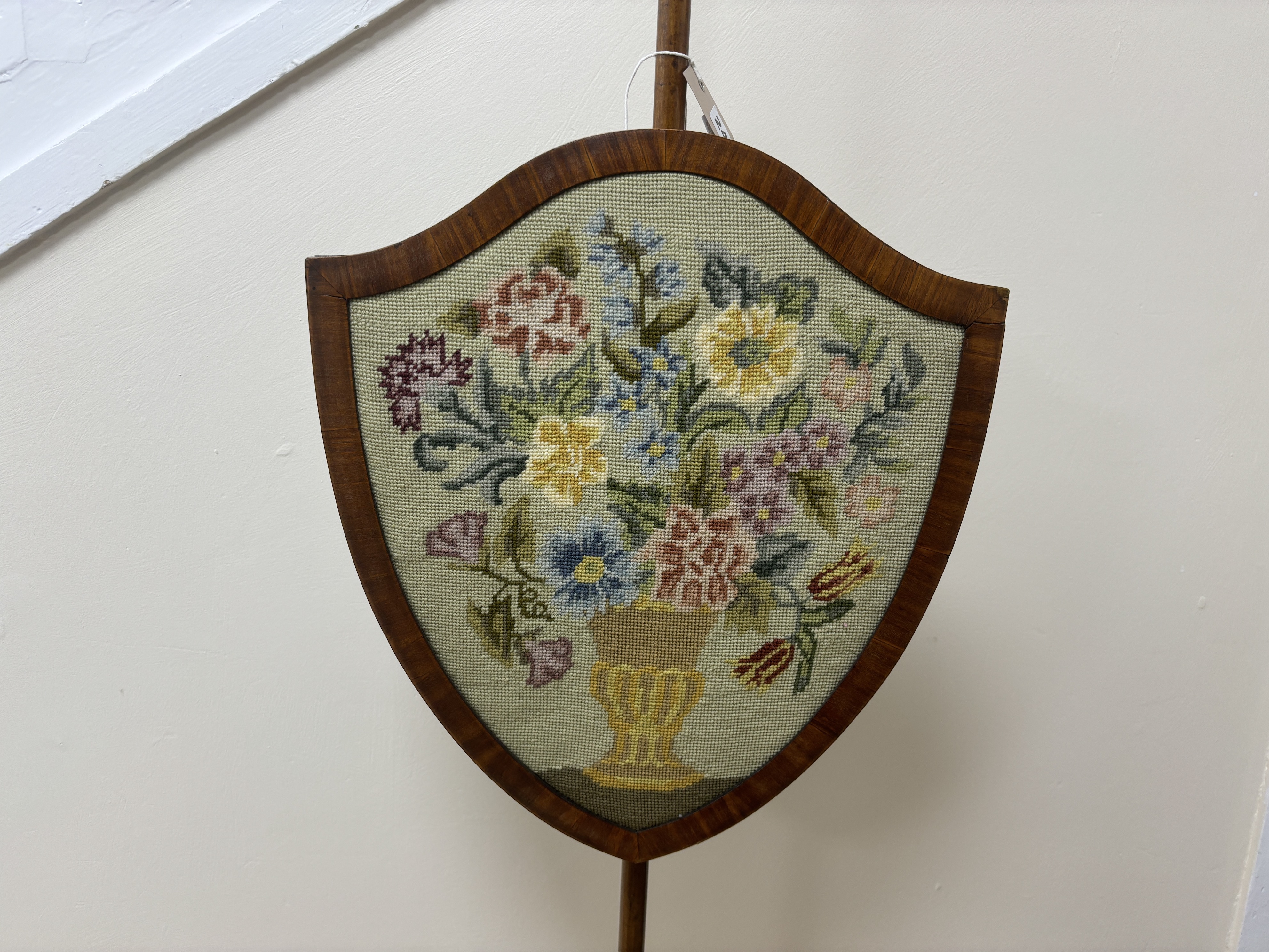 A Sheraton polescreen, height 140cm